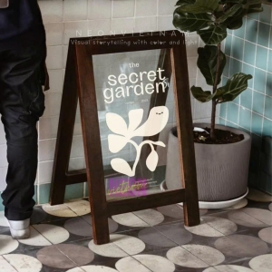 wooden sidewalk sign