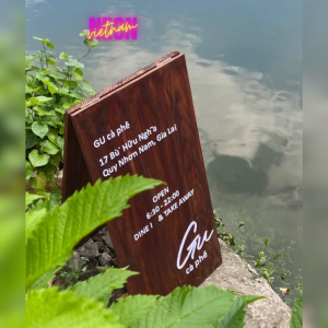 wooden standy sidewalk sign