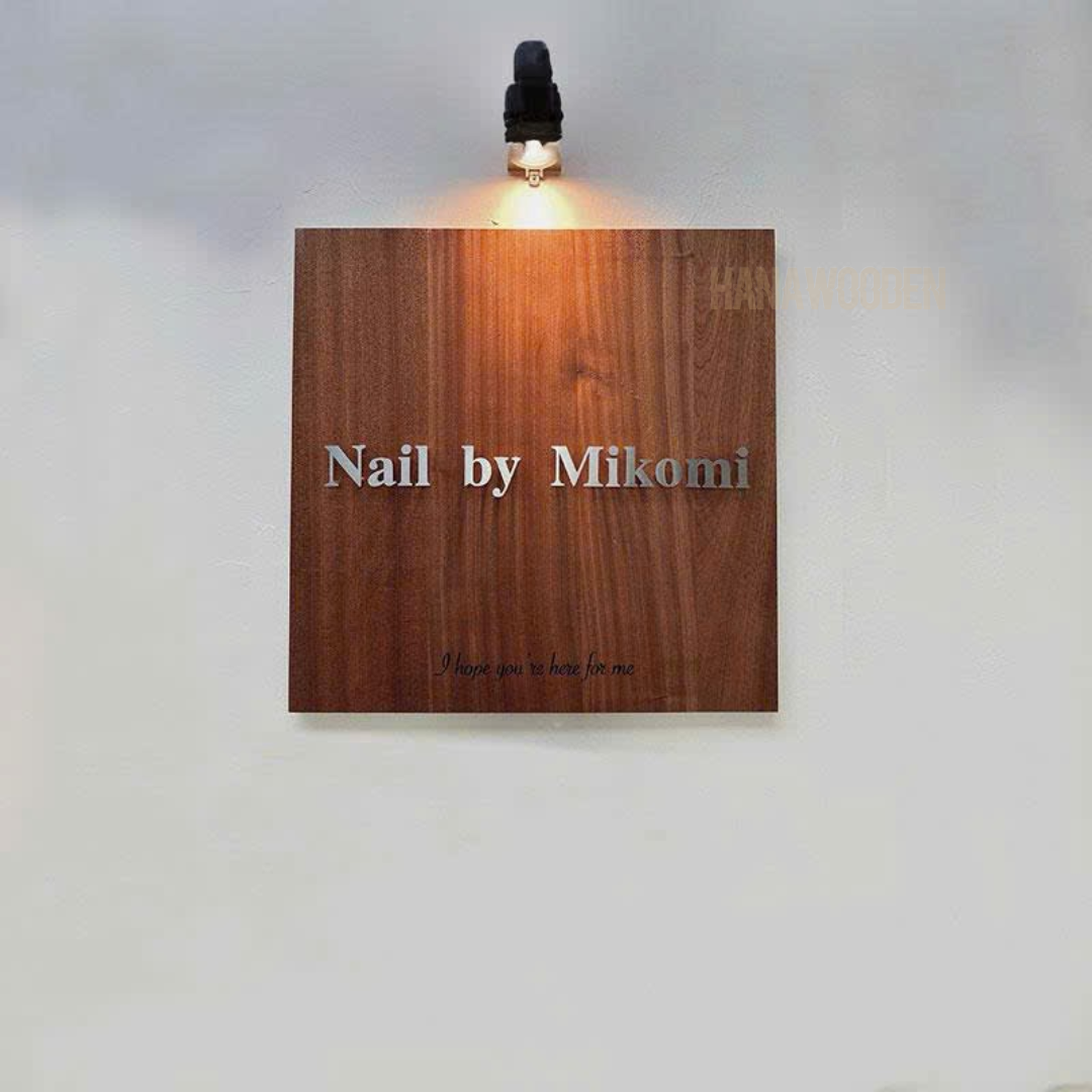 Wooden sign engraved with house number, company name, shop name, and opening hours. - Image 5