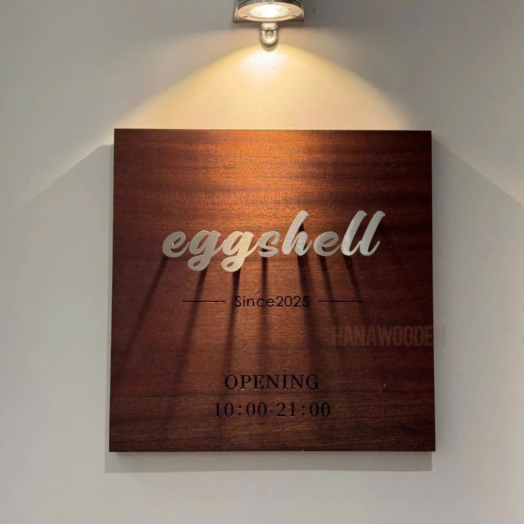 Wooden sign engraved with house number, company name, shop name, and opening hours. - Image 10