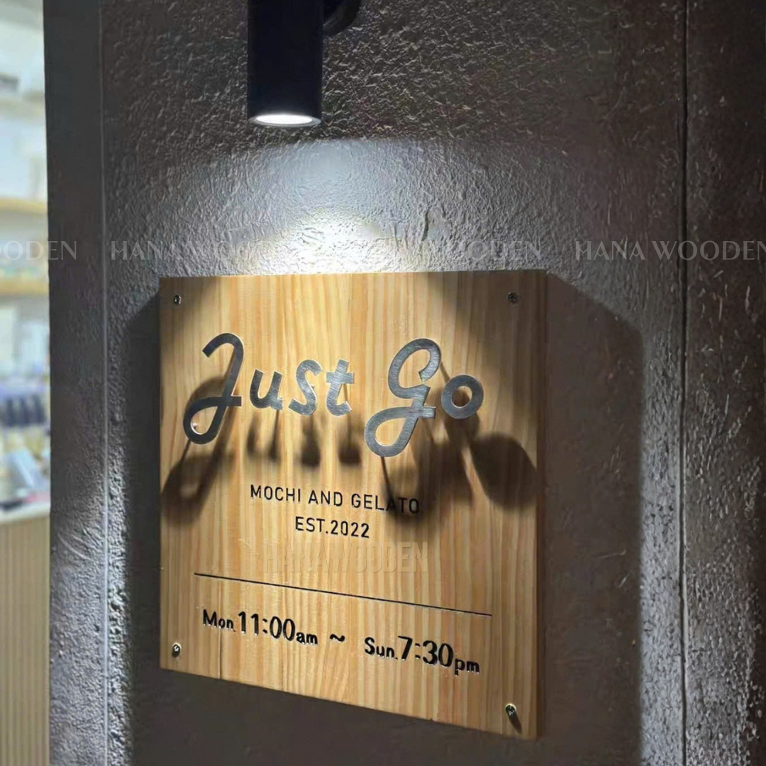 Wooden sign engraved with house number, company name, shop name, and opening hours. - Image 13